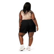 TSK Unisex Athletic Long Shorts — back view on plus-size model