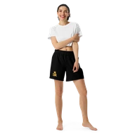 TSK Unisex Athletic Long Shorts — front view on woman model
