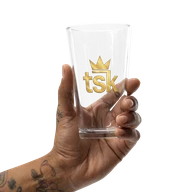 TSK Logo Glass — hand-held front view